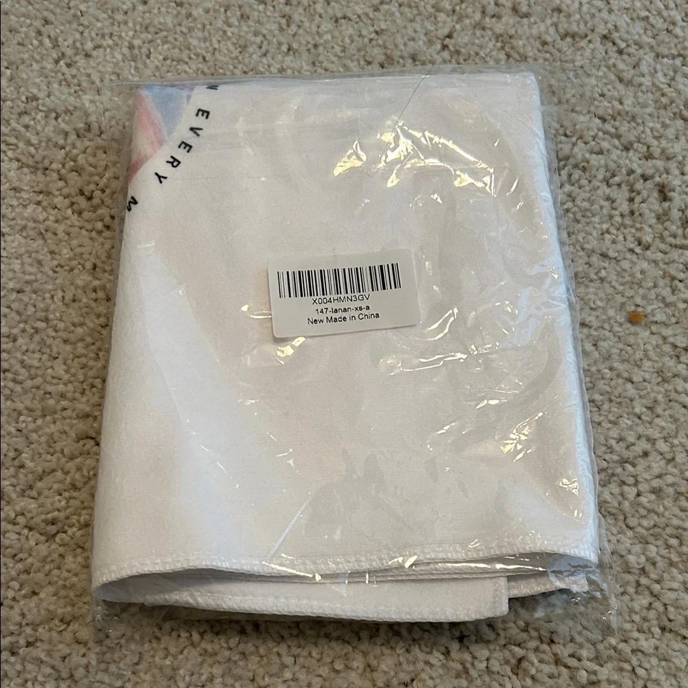White Towel with Sunrise Design